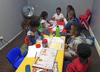 Children engaged in classroom learning activities.